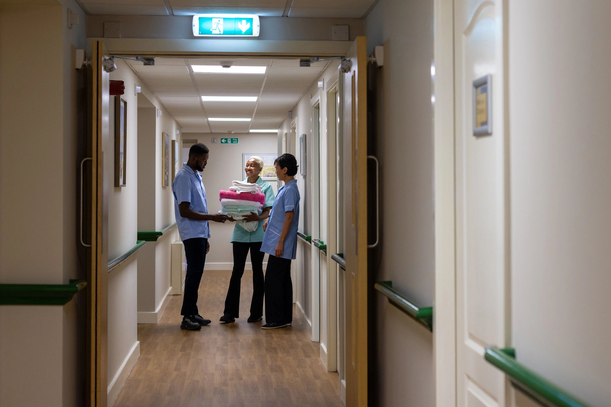 Healthcare workers in a clean corridor